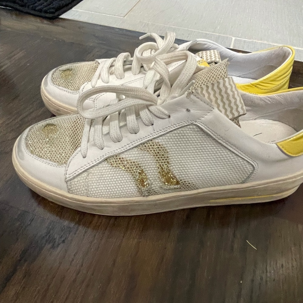 Barely worn 275 central yellow and white sneakers